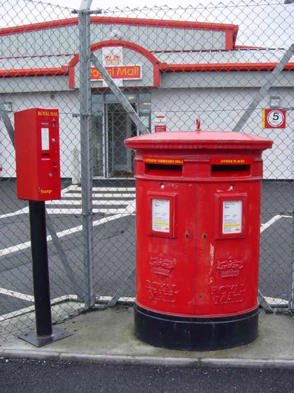 Photo: Stamps and Letter Box