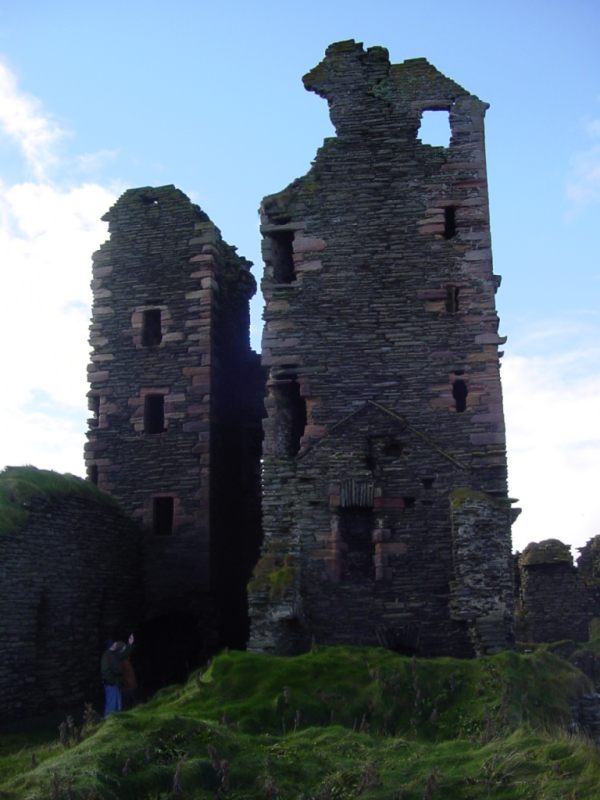 Photo: Castle Towers Above Onlookers
