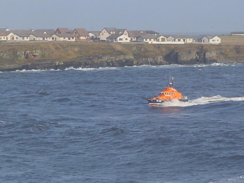 Photo: Braving The Waves Into Wick