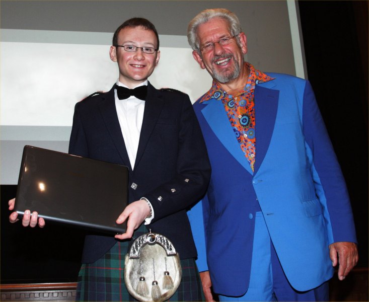 Photo: Erik Mackay Receving His Prize From Adam Hart-Davies