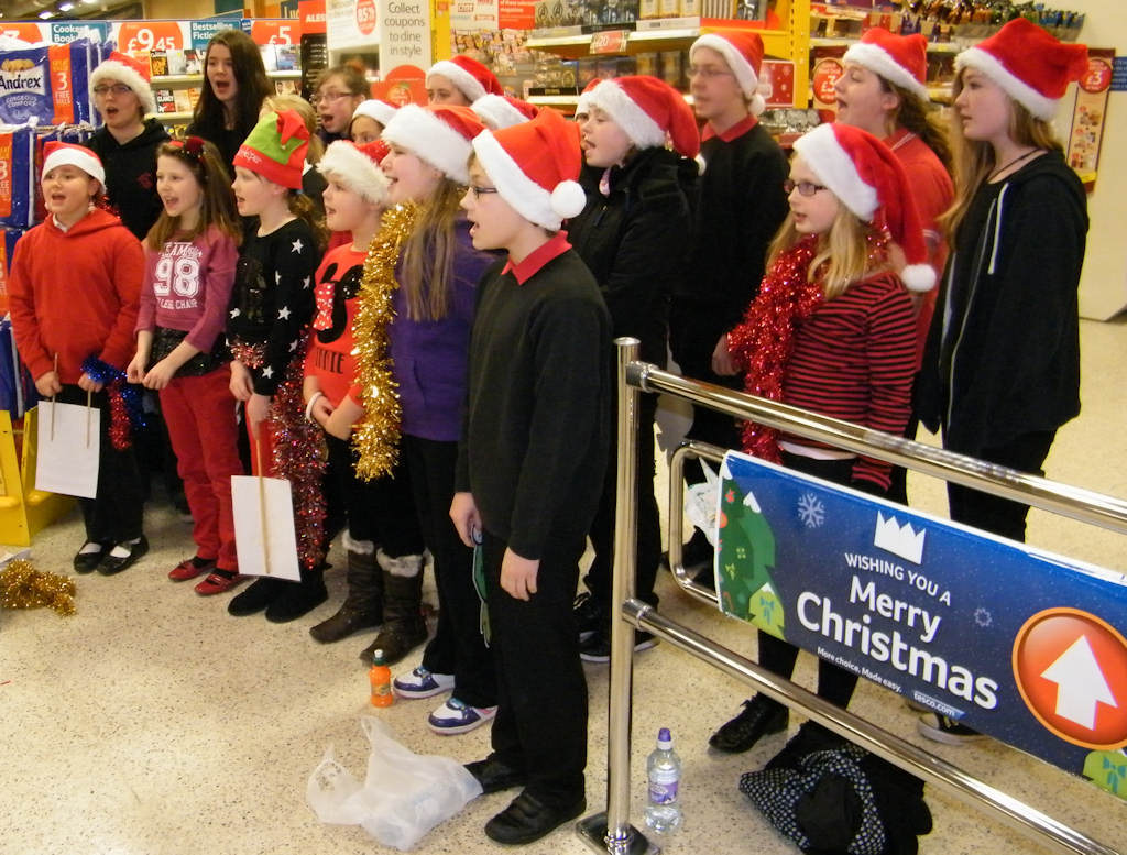 Photo: Caithness and North Sutherland Children's Choir Singing Christmas songs At Tesco