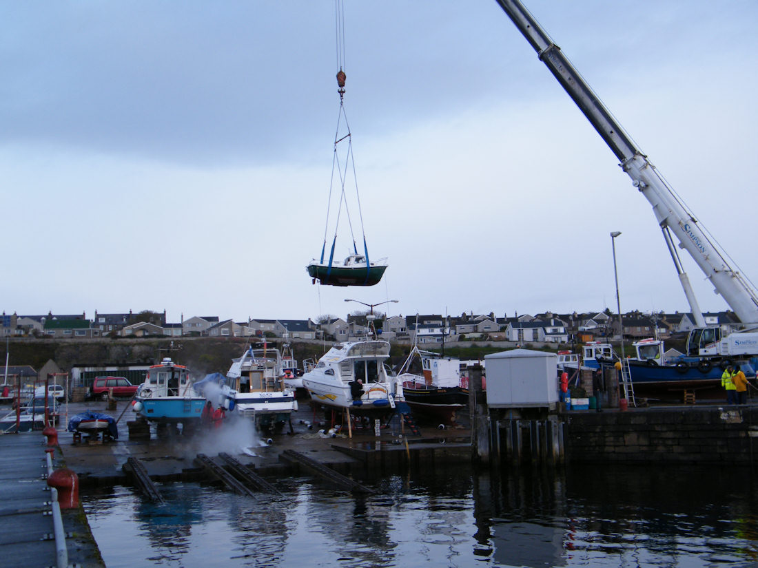 Photo: Lifting Small Boats Out Of The Water At Wick Harbour