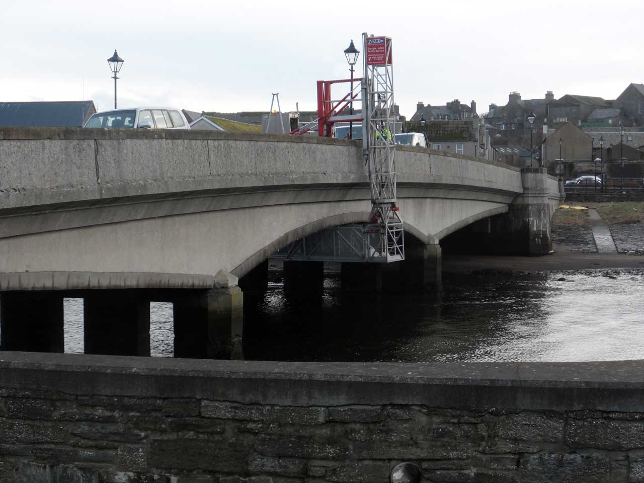 Photo: Repairing Pipes Under Service Bridge, Wick