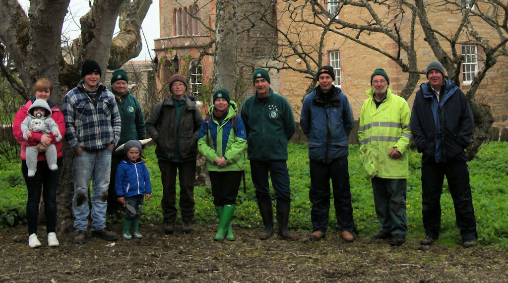 Photo: Volunteers work in woodlands at Castle Mey