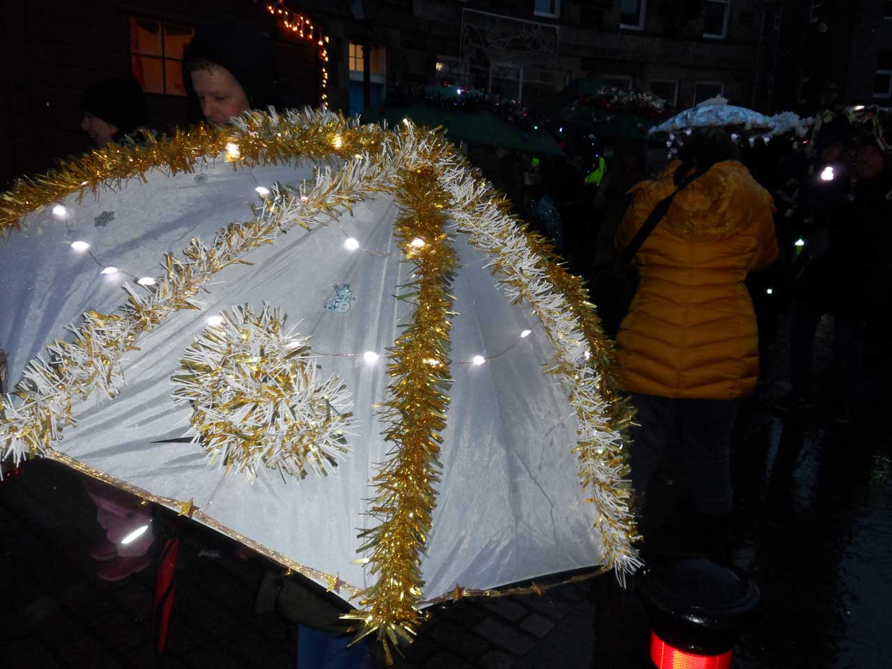 Photo: Christmas Umbrella Parade In Wick
