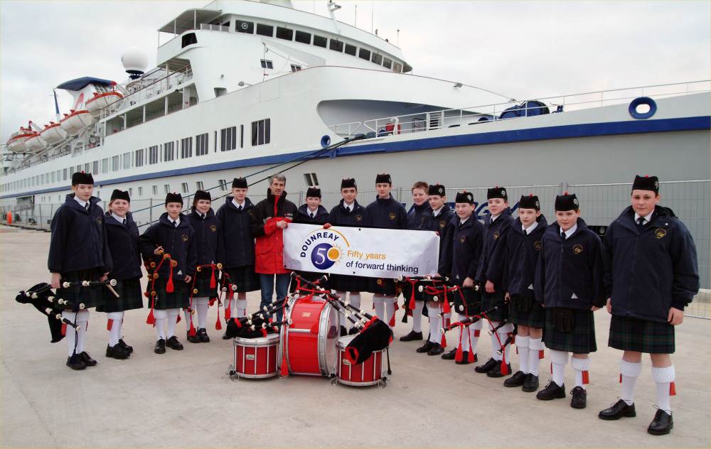 Photo: Caithness Junior Pipe Band In Front Of Cruise Liner Van Goghat At Scrabster