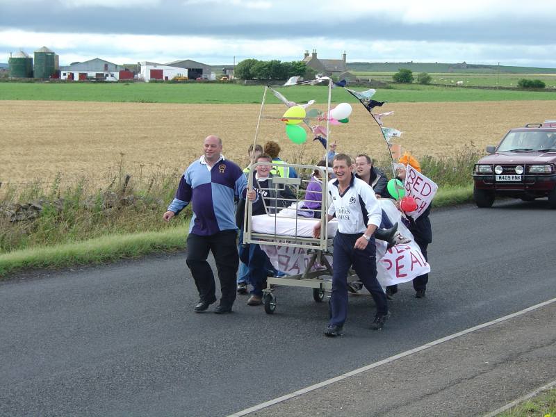 Photo: 21 Teams Push Bed For Elaine Maddeford From Thurso To Wick
