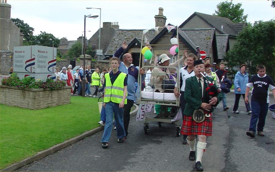 Photo: 21 Teams Push Bed For Elaine Maddeford From Thurso To Wick