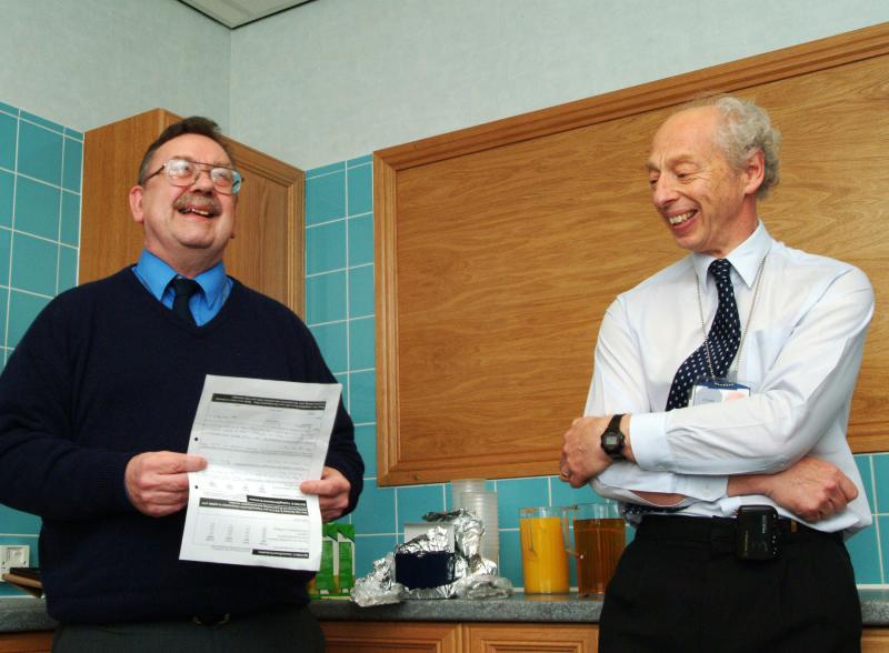 Photo: Brian Hughes left shares a light-hearted moment with David Lord, Environmental Compliance Manager