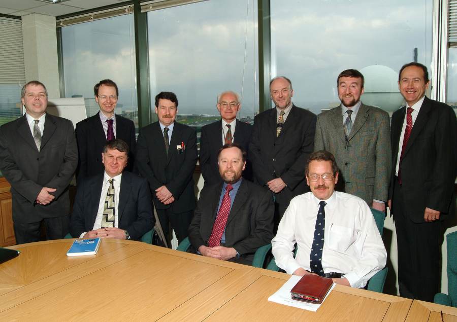 Photo: Dr Stephen Cowlam seated centre with colleagues at his last Dounreay Management meeting