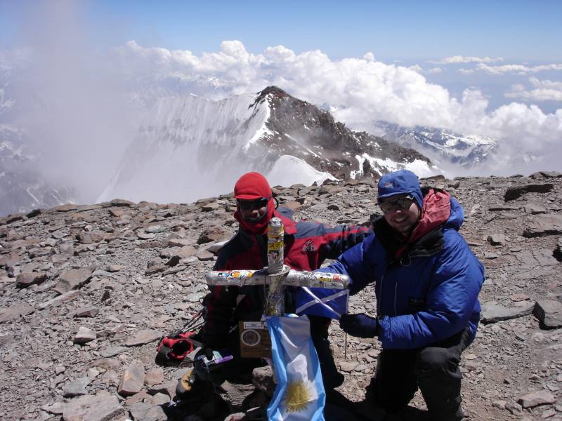 Photo: Bob Kerr on the right with Bauty at the summit of Aconcagua 6962m