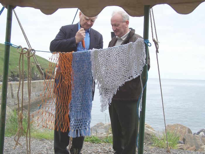 Photo: George Carter Teaching Lord MacLennan Net Making