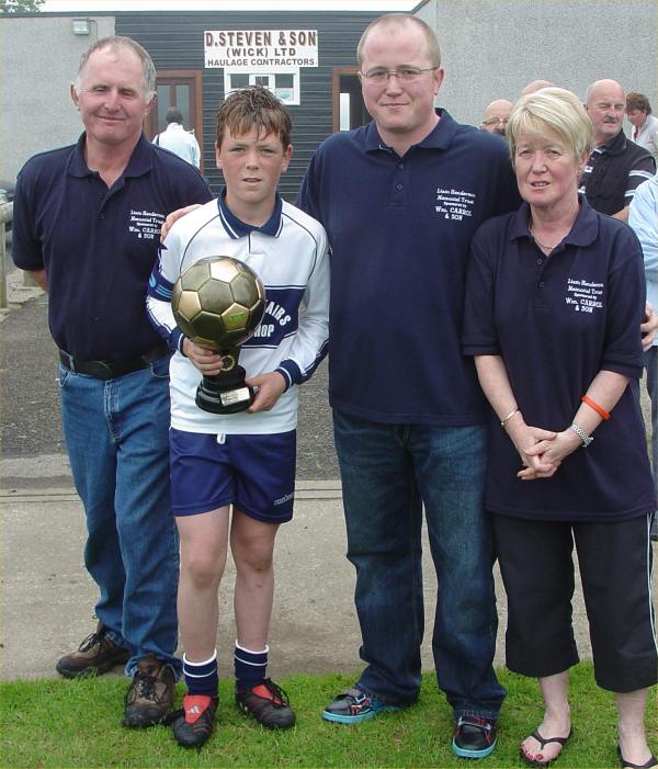Photo: Henderson Family Present The Cup To South School