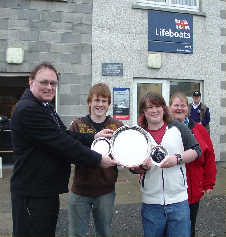 Photo: Owen and Morgan Sinclair - Award For Services To The Lifeboat From Murray Lamond