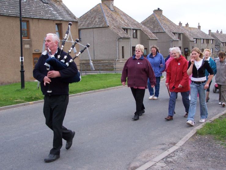 Photo: Lybster WRI Cancer Walk Led By Piper Ernest Budge