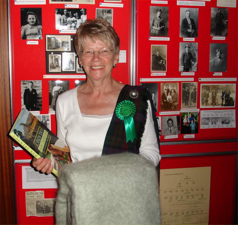 Photo: Isobel Cameron at Saturday nights ceilidh with the gifts she received from visitors from abroad