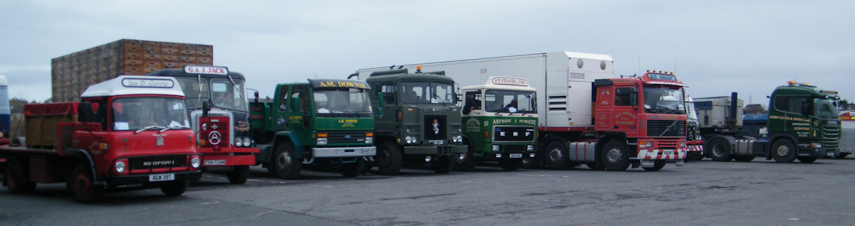 Photo: A Short Line Of Vintage commercial Vehicles