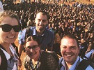 Caitlin Morrison a Wick High School teacher in sunglasses with teachers and puils in Rwanda